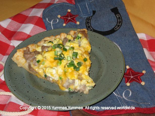 Biscuits and Gravy Pizza - topped with scrambled eggs, cheese, and green onions.