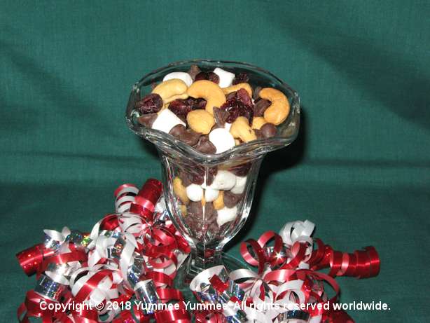 Snack time or a party dish - cashews, mini-marshmallows, chocolate chips, and dried cranberries. Yummee Yummee stuff!