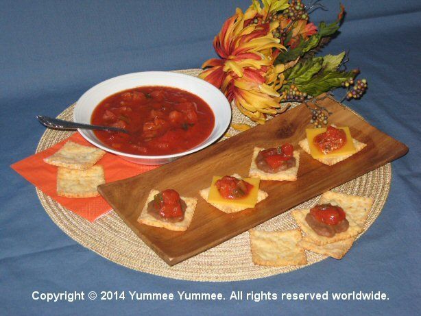 Top Nacho Cheese Crackers with cheese, beans, and salsa.