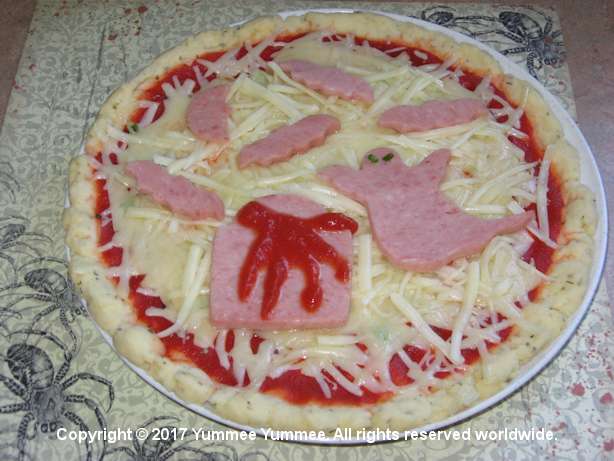 A ghostly graveyard gluten-free pizza. Yum! A ghostly graveyard gluten-free pizza. Yum!