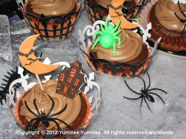 Make Spooktacular Cupcakes with picks and spider rings for an extra special touch.