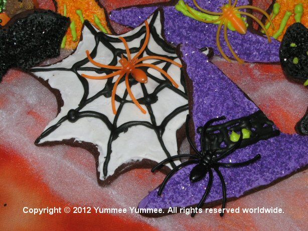 Make Cut Cookies and add Spider Rings for a simple, creepy touch to your cookies. Make Cut Cookies and add Spider Rings for a simple, creepy touch to your cookies.