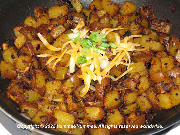 Put a spicy twist on fried potatoes with cumin, chili powder, chives, & onion.