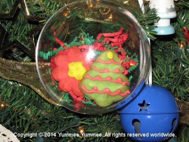 Spritz cookies are the perfect size to fit in an ornament. Have fun decorating, or not. Spritz cookies are the perfect size to fit in an ornament. Have fun decorating, or not.