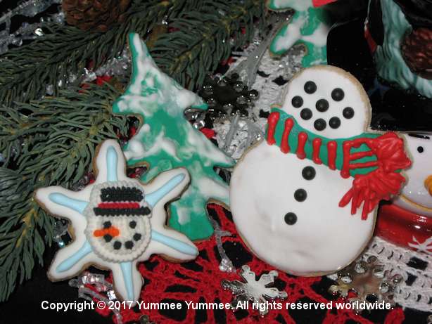 Warm up the kitchen and bake some cookies. Use your creativity to decorate a snowman and tree.